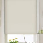Cream dim out roller blind