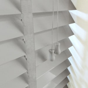 Light grey Venetian blinds with tapes next day