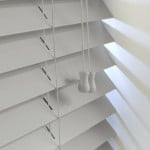  light grey wood venetian blinds with cords