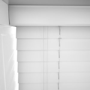 white wooden blinds